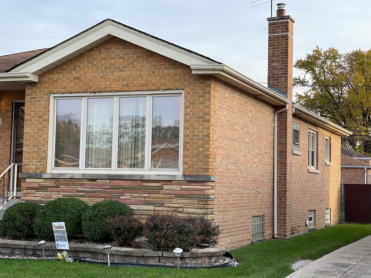 3119 West 84th Place Chicago, IL 60652 - Photo 2 of 4 a front view of a house with garden