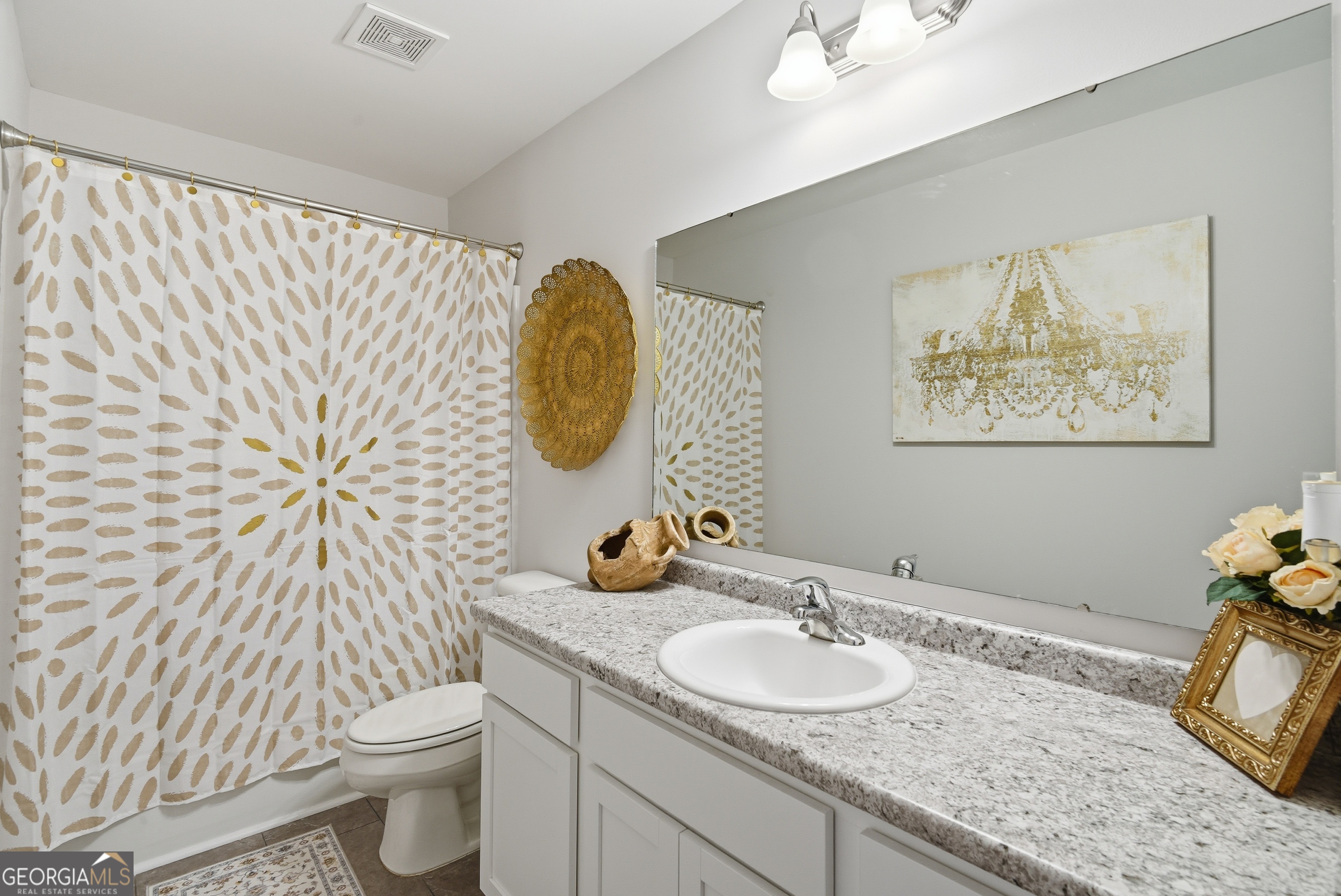 1160 Turpentine Trail Fort Stewart, GA 31313 - Photo 20 of 39 a bathroom with a toilet sink and mirror