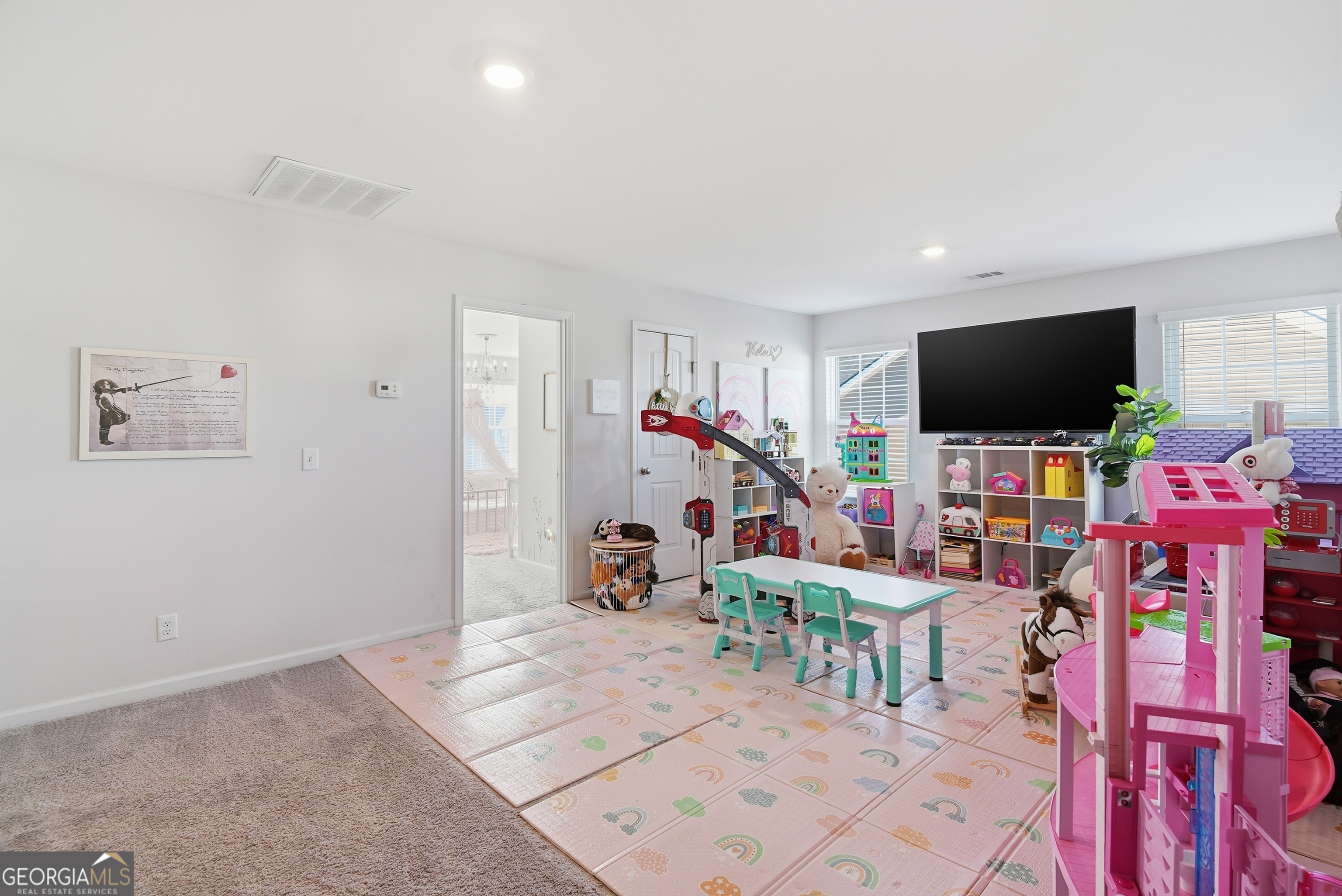 1160 Turpentine Trail Fort Stewart, GA 31313 - Photo 24 of 39 a living room with furniture and a flat screen tv