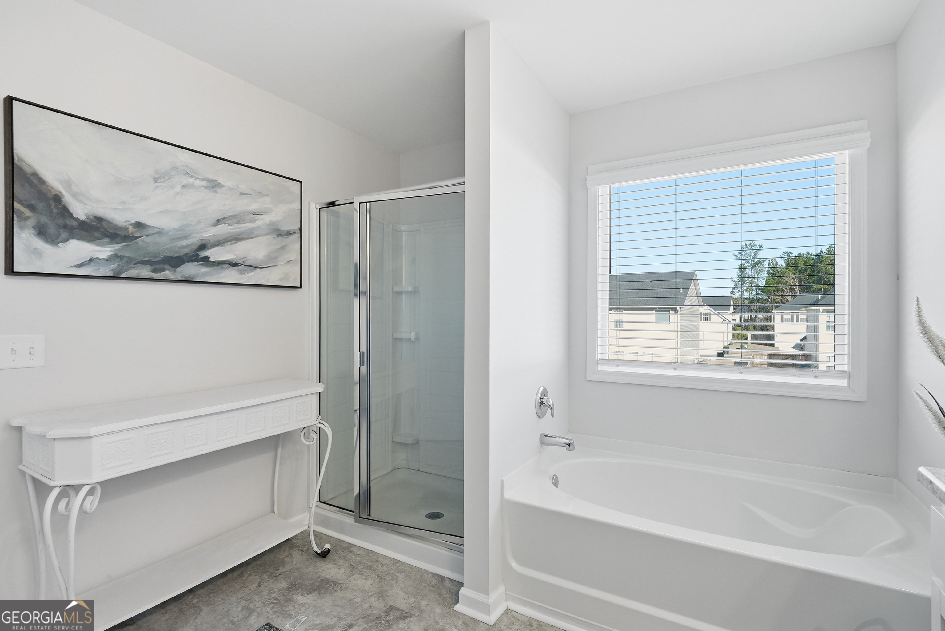 1160 Turpentine Trail Fort Stewart, GA 31313 - Photo 30 of 39 a bathroom with a bathtub and a shower