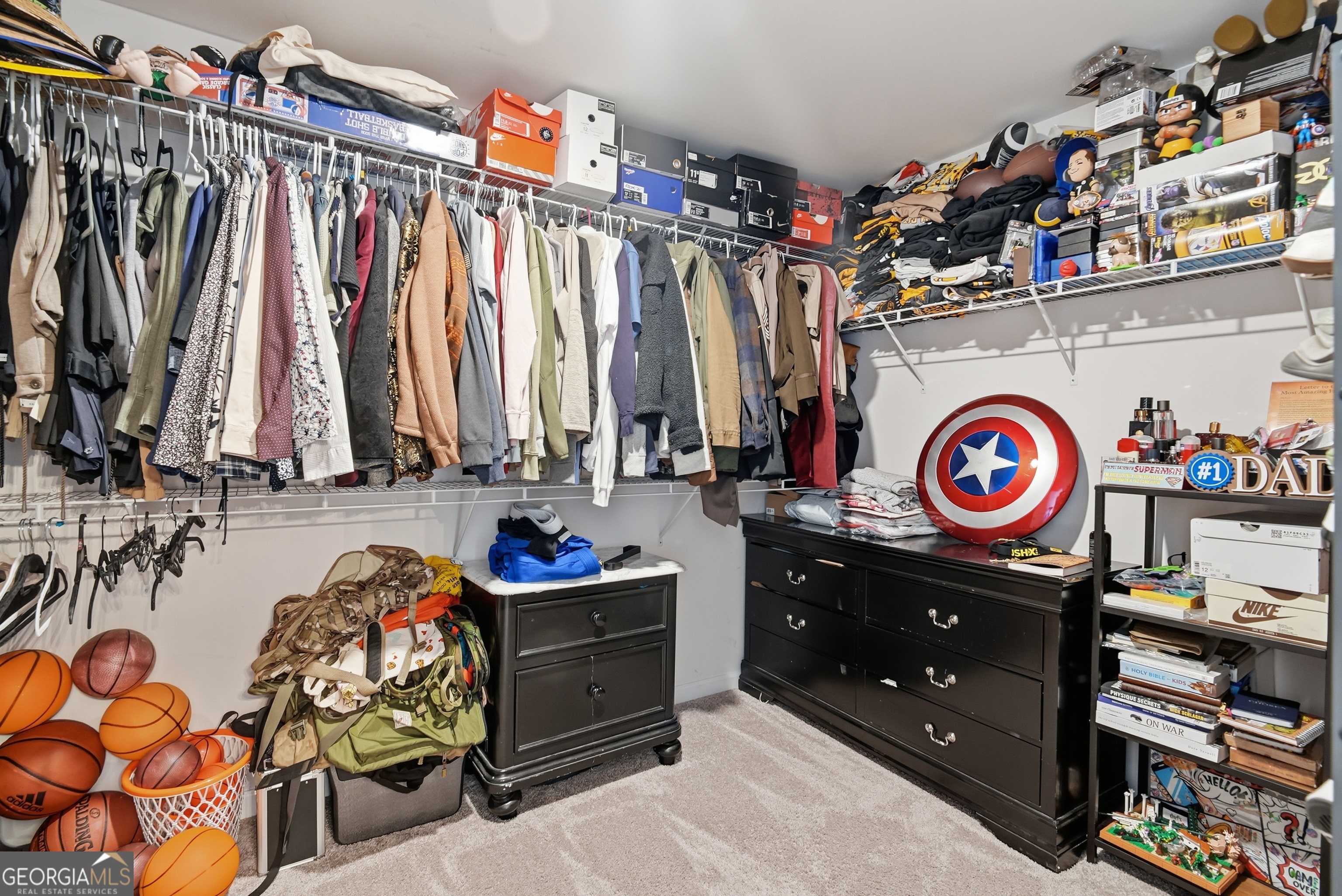 1160 Turpentine Trail Fort Stewart, GA 31313 - Photo 31 of 39 a view of a walk in closet and clothes