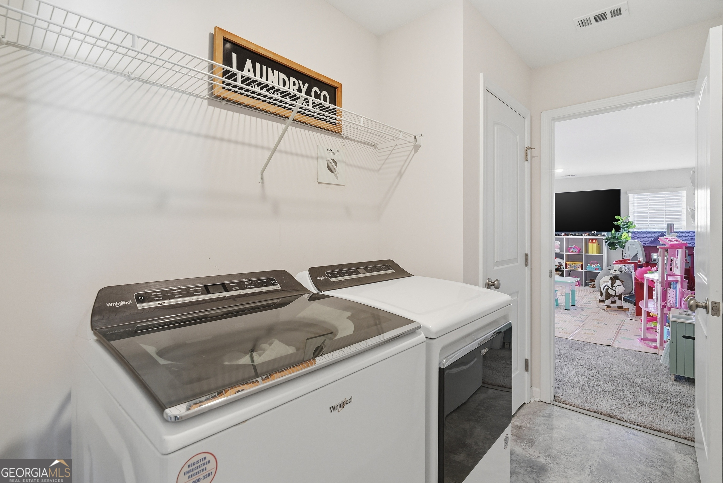 1160 Turpentine Trail Fort Stewart, GA 31313 - Photo 32 of 39 a utility room with dryer and washer