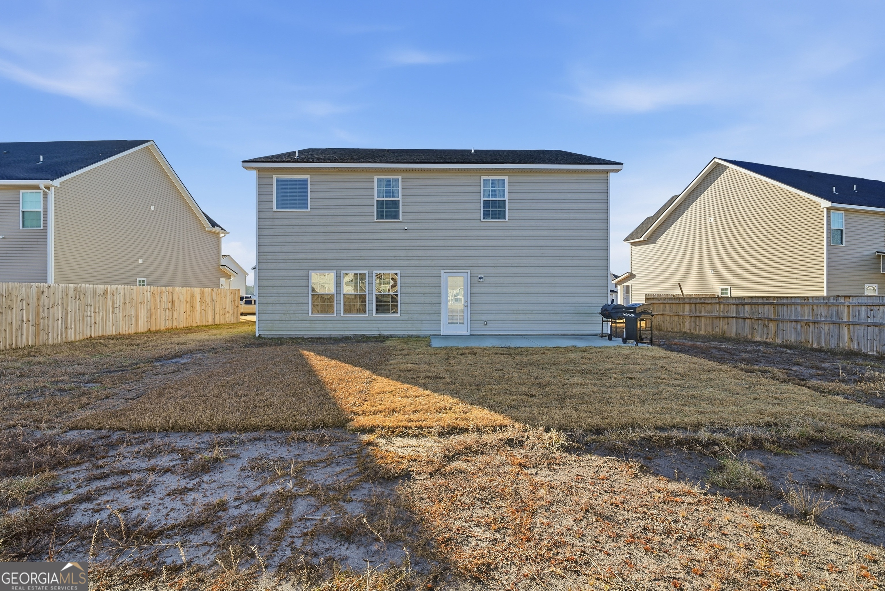 1160 Turpentine Trail Fort Stewart, GA 31313 - Photo 36 of 39 a house view with a backyard space