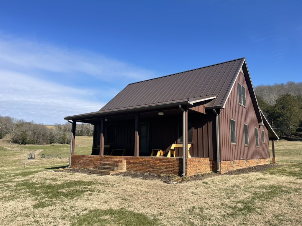 501 Gray Road Lynchburg, TN 37352 - Photo 1 of 44 a view of a house with a outdoor space