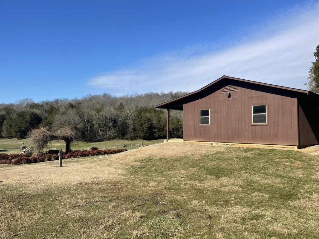 501 Gray Road Lynchburg, TN 37352 - Photo 20 of 44 a view of a house with a yard
