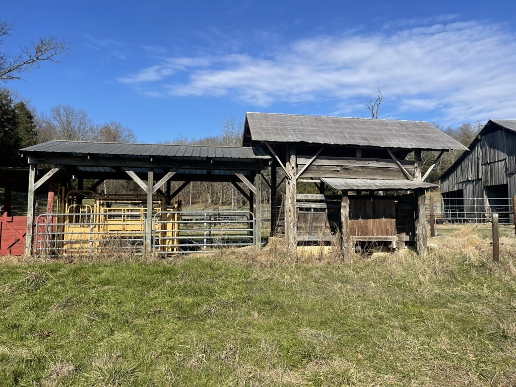 501 Gray Road Lynchburg, TN 37352 - Photo 31 of 44 a house with trees in the background