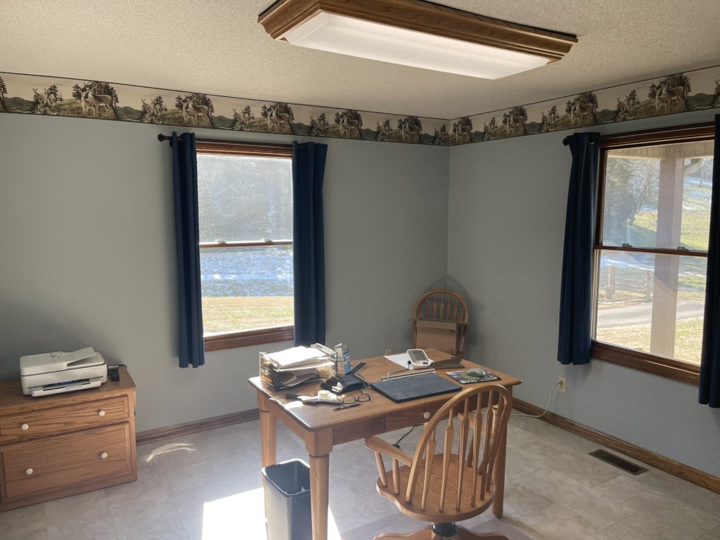 501 Gray Road Lynchburg, TN 37352 - Photo 7 of 44 a view of a workspace with furniture and window