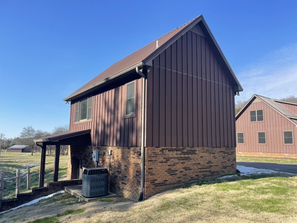501 Gray Road Lynchburg, TN 37352 - Photo 10 of 44 a view of front of house with wooden fence