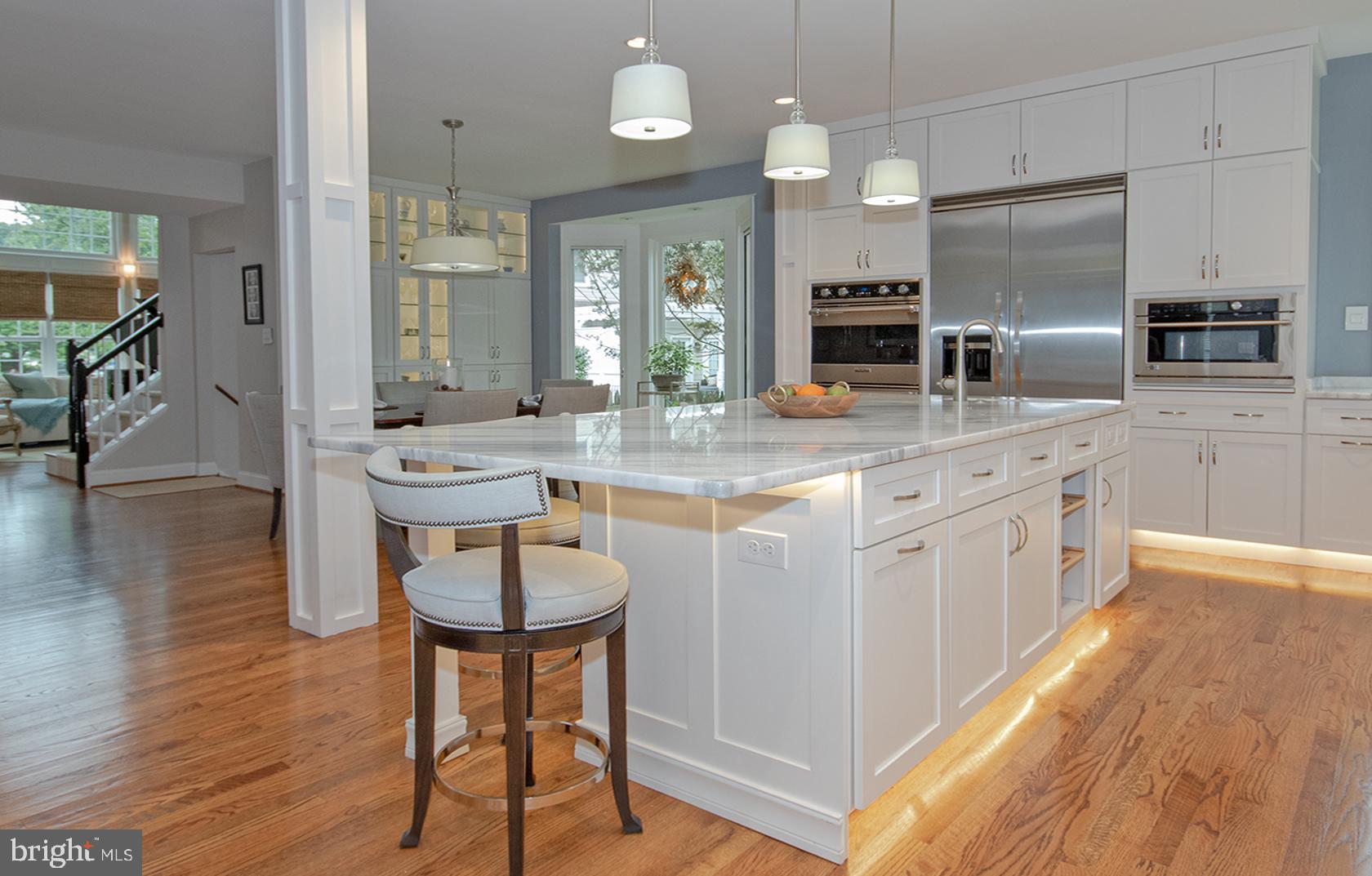 1203 Night Star Court Reston, VA 20194 - Photo 14 of 39 Kitchen opens to Large Dining Room