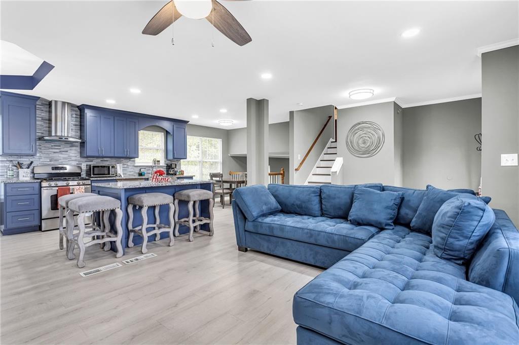 2812 Manassas Court Decatur, GA 30034 - Photo 1 of 1 a living room with furniture and kitchen view