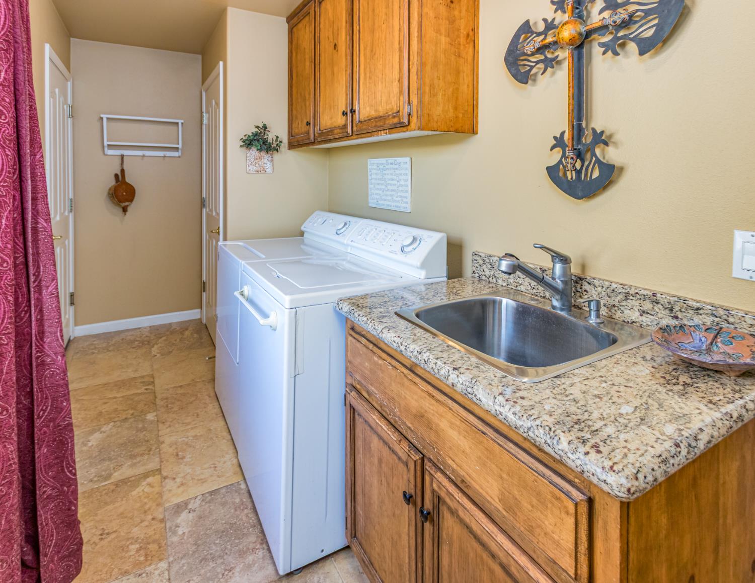9290 Cramer Road Auburn, CA 95602 - Photo 30 of 66 Indoor Laundry room with storage closet and sink. Gas or electric for the dryer