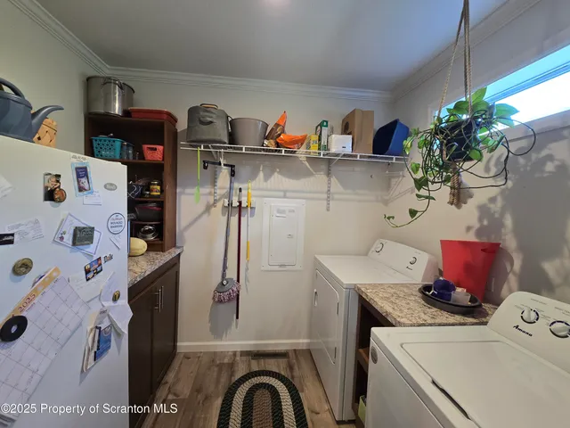 a kitchen with stainless steel appliances granite countertop a lot of counter top space