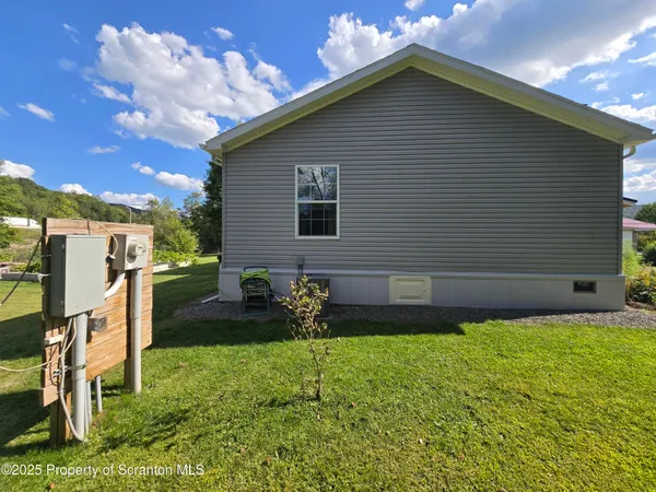 a view of a back yard of the house