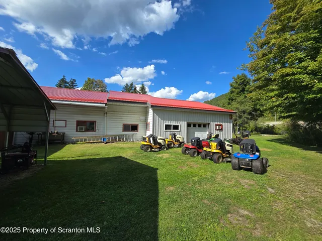 a house view with a backyard space