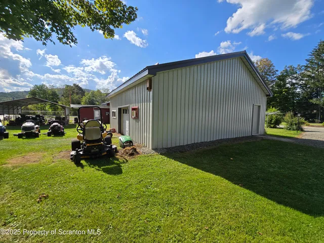 a view of a golf course with a lake