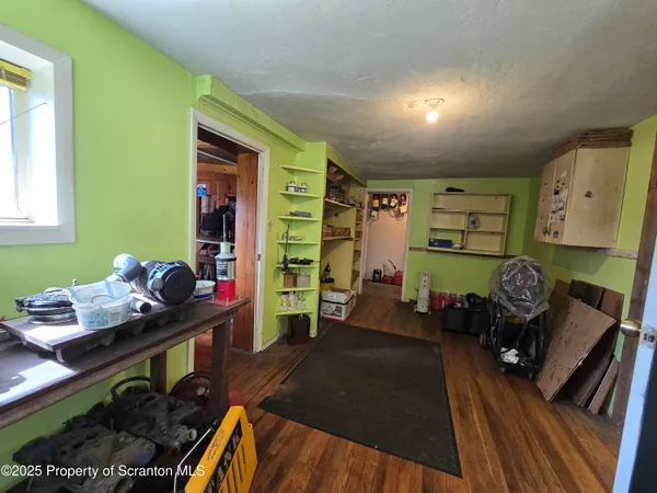a view of an empty room with stairs