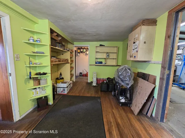 a view of store room with wooden floor
