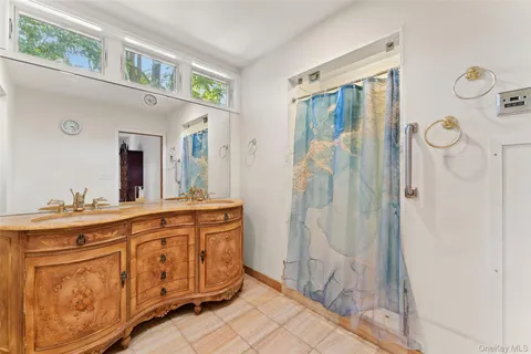 a bedroom with a bed and a closet