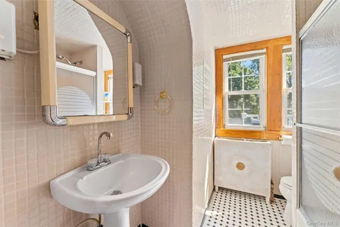 a view of a hallway with closet area