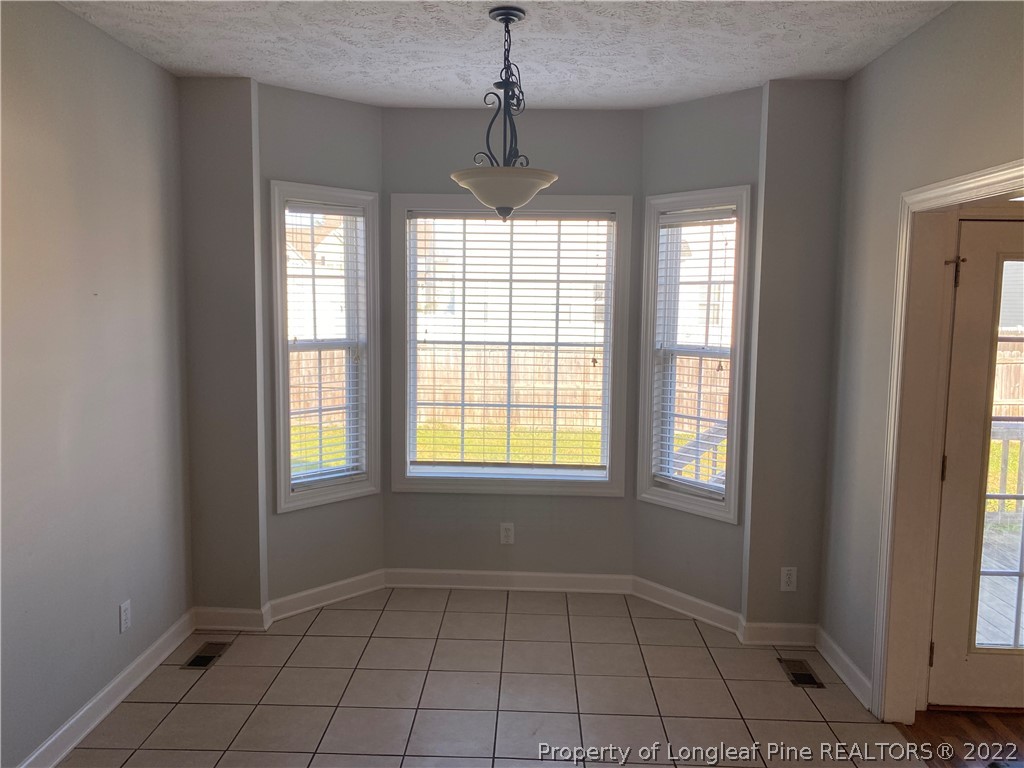 3532 Talus Road Fayetteville, NC 28306 - Photo 13 of 34 a view of an empty room with a window