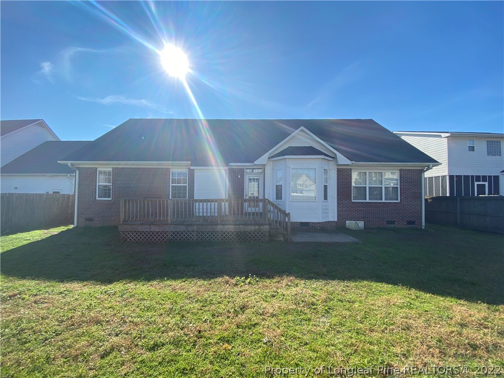 3532 Talus Road Fayetteville, NC 28306 - Photo 2 of 34 a front view of a house with a yard