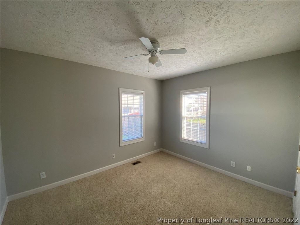 3532 Talus Road Fayetteville, NC 28306 - Photo 28 of 34 a view of an empty room with a window