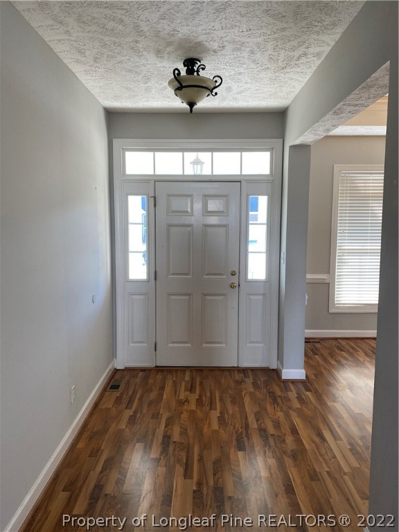 3532 Talus Road Fayetteville, NC 28306 - Photo 5 of 34 a view of entryway with wooden floor