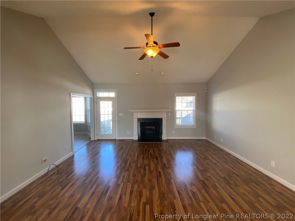 3532 Talus Road Fayetteville, NC 28306 - Photo 10 of 34 a view of a room window wooden floor and fire place