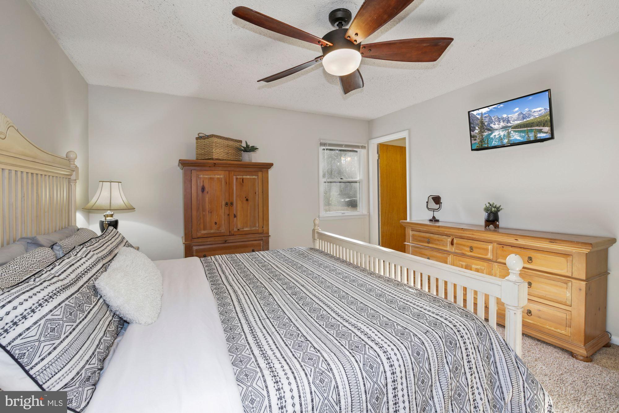 3 Canal Road Ocean Pines, MD 21811 - Photo 13 of 31 Spacious Primary Bedroom w/ en-suite bath