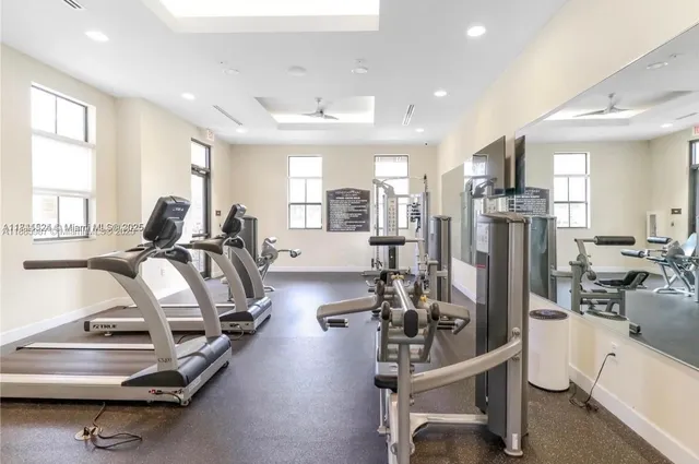 a view of the house with potted plants