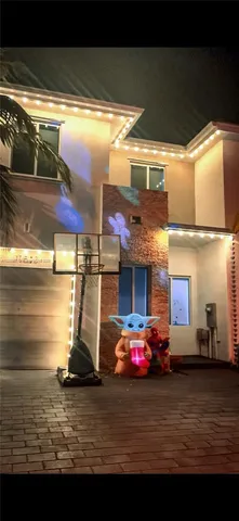 a view of a swimming pool with a yard