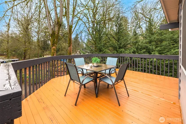 a view of balcony with furniture