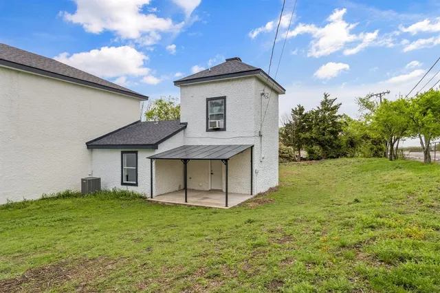 a view of a kitchen with electric appliances