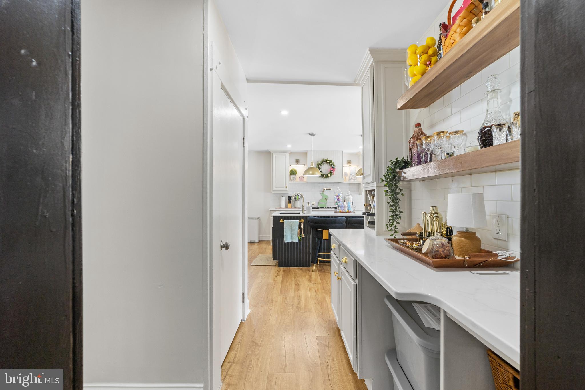 320 West Maple Avenue Merchantville, NJ 08109 - Photo 18 of 67 a kitchen with a sink dishwasher and a stove with wooden floor