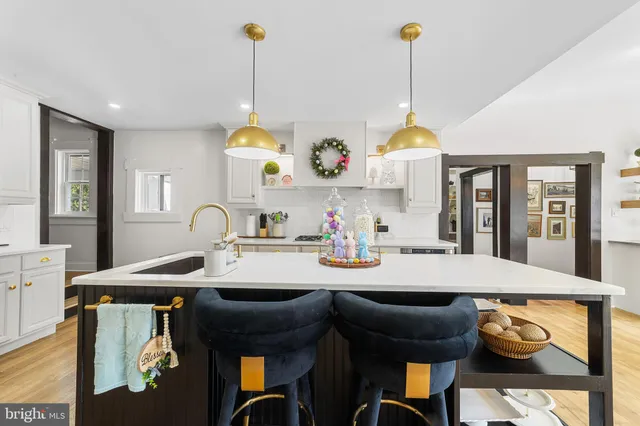 a refrigerator freezer sitting inside of a kitchen