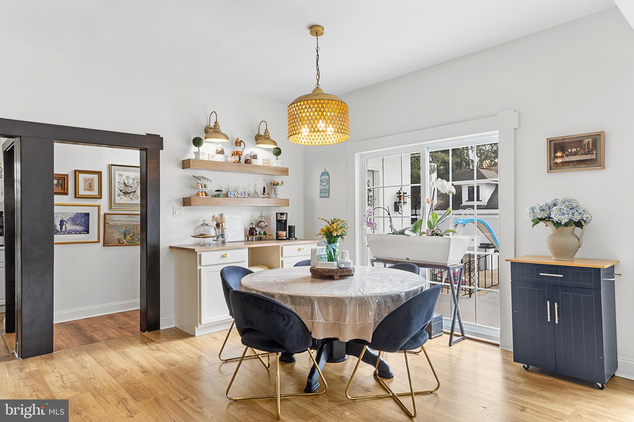 320 West Maple Avenue Merchantville, NJ 08109 - Photo 27 of 67 a view of a dining room with furniture and chandelier