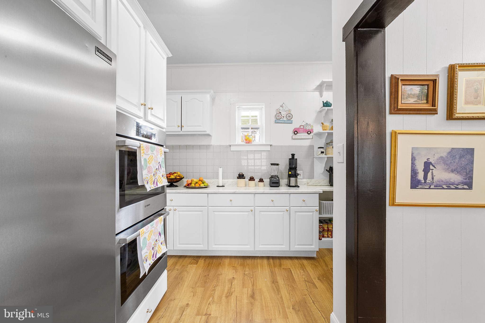 320 West Maple Avenue Merchantville, NJ 08109 - Photo 28 of 67 a kitchen with stainless steel appliances a cabinets and a refrigerator