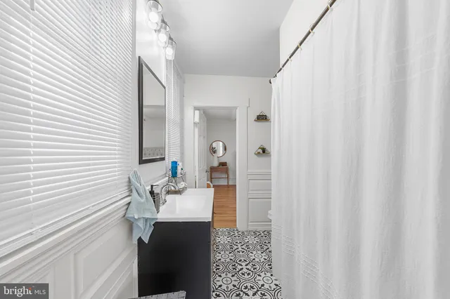 a room with a bed and a window