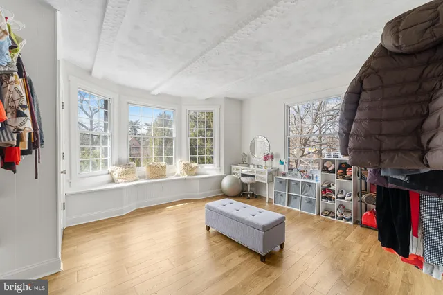 a bathroom with a double vanity sink and mirror