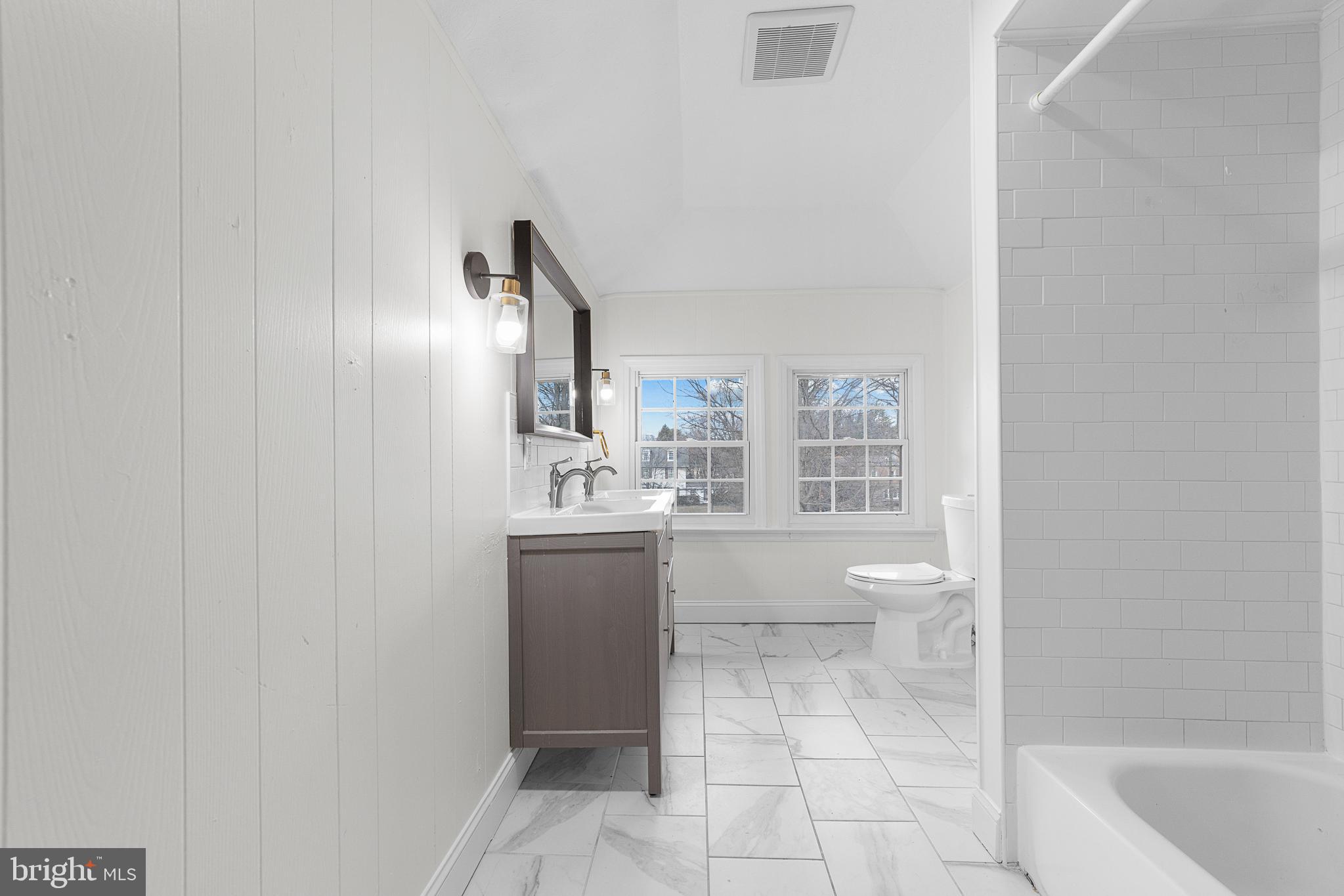 320 West Maple Avenue Merchantville, NJ 08109 - Photo 54 of 67 a bathroom with a toilet sink and mirror