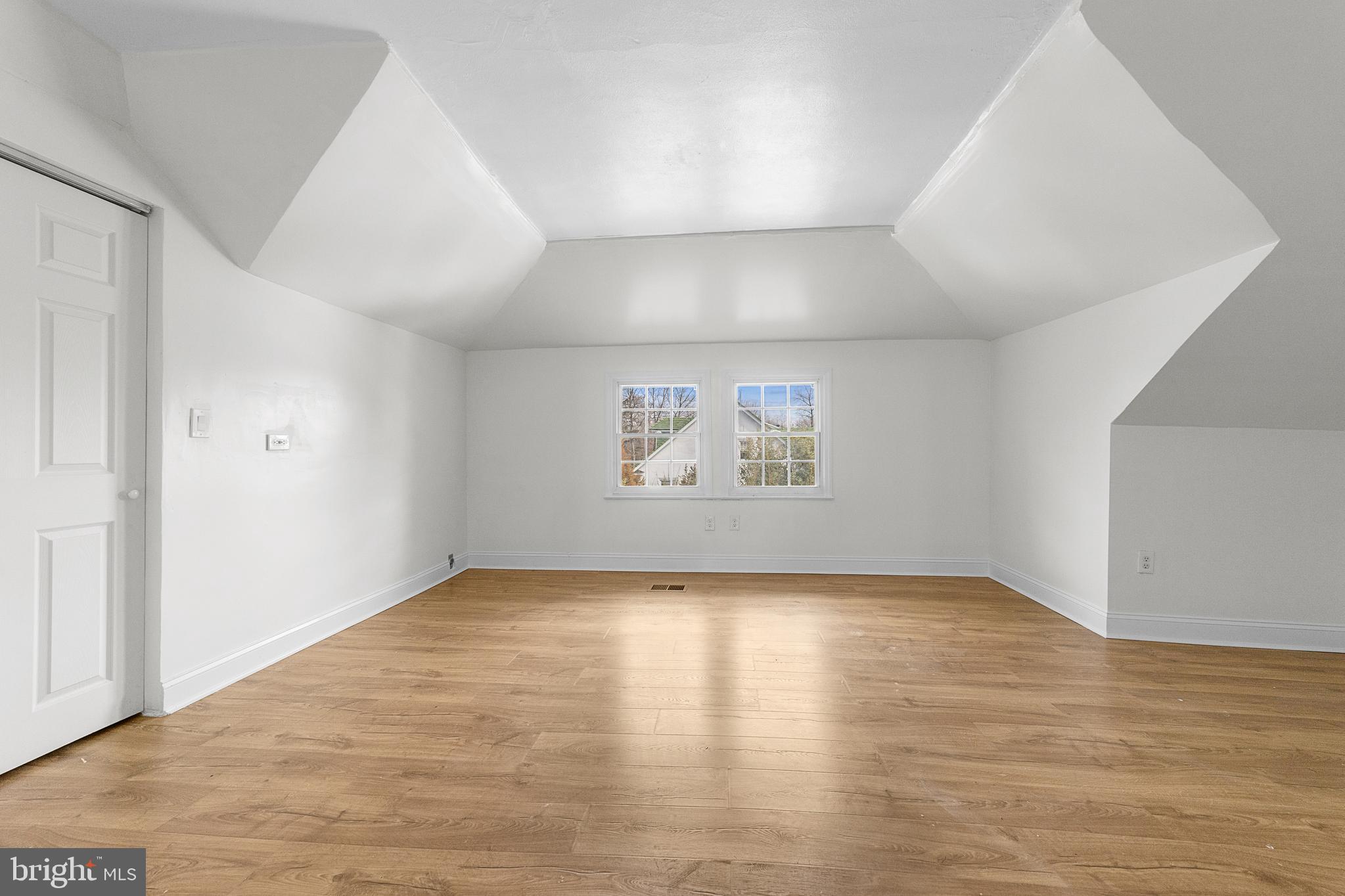320 West Maple Avenue Merchantville, NJ 08109 - Photo 56 of 67 an empty room with wooden floor and windows
