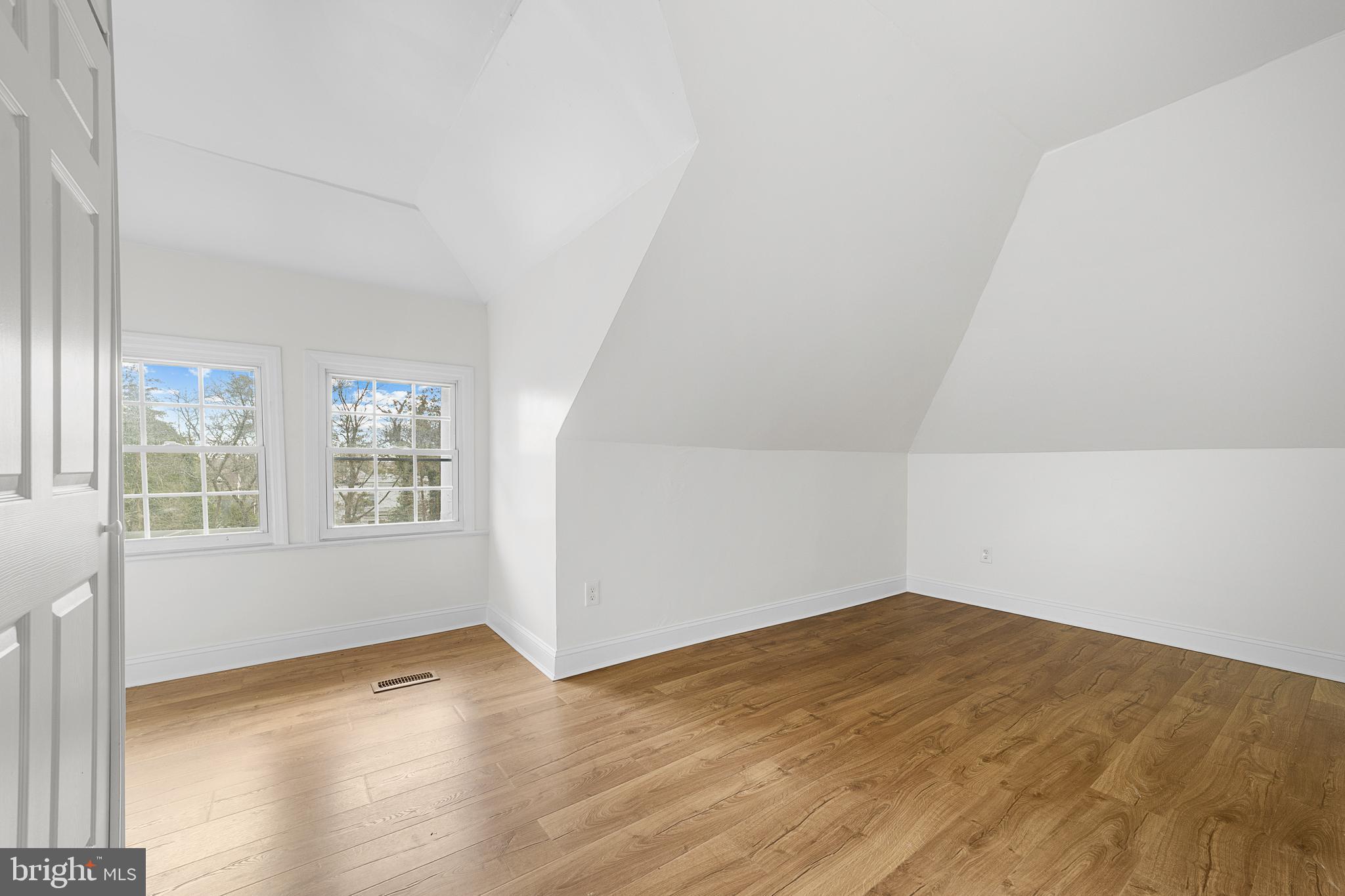 320 West Maple Avenue Merchantville, NJ 08109 - Photo 57 of 67 an empty room with wooden floor and windows