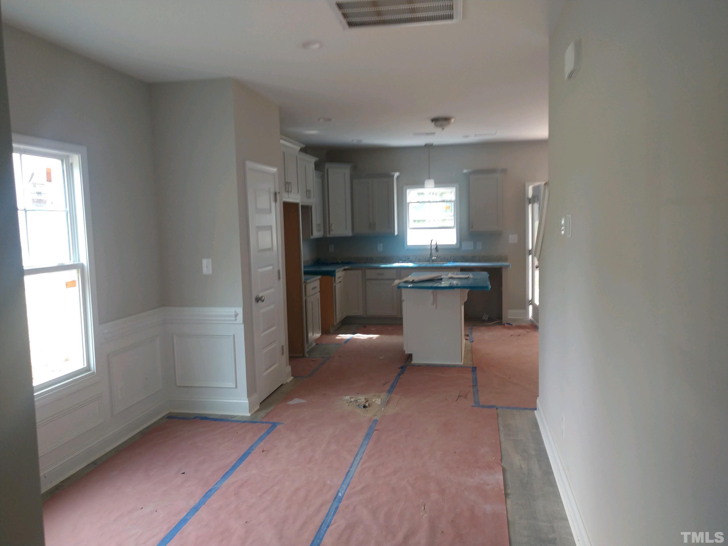 2967 Wire Road Erwin, NC 28339 - Photo 2 of 11 a view of a kitchen with a sink cabinets and window
