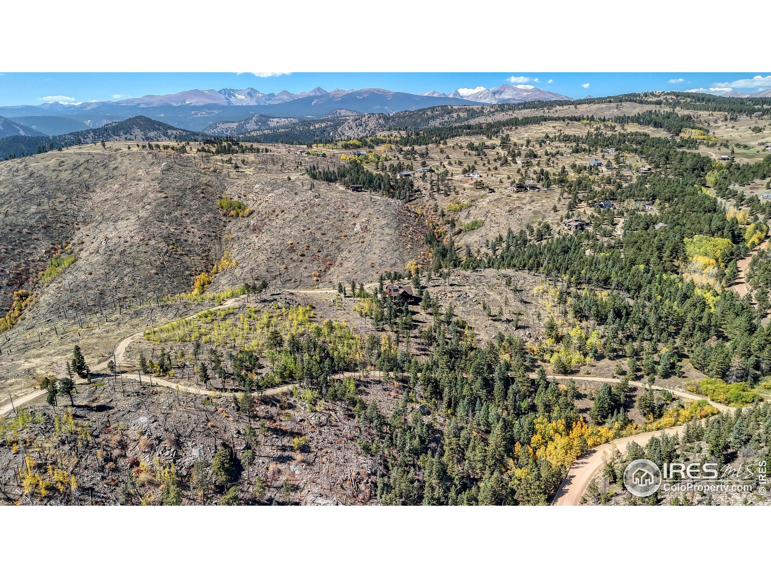 98 Rim Road Boulder, CO 80302 - Photo 3 of 43 a view of an outdoor space and a mountain view