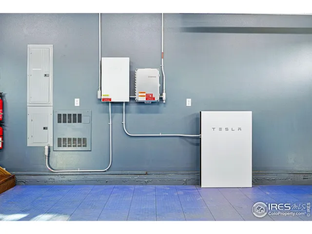 a view of a city with mountains in the background