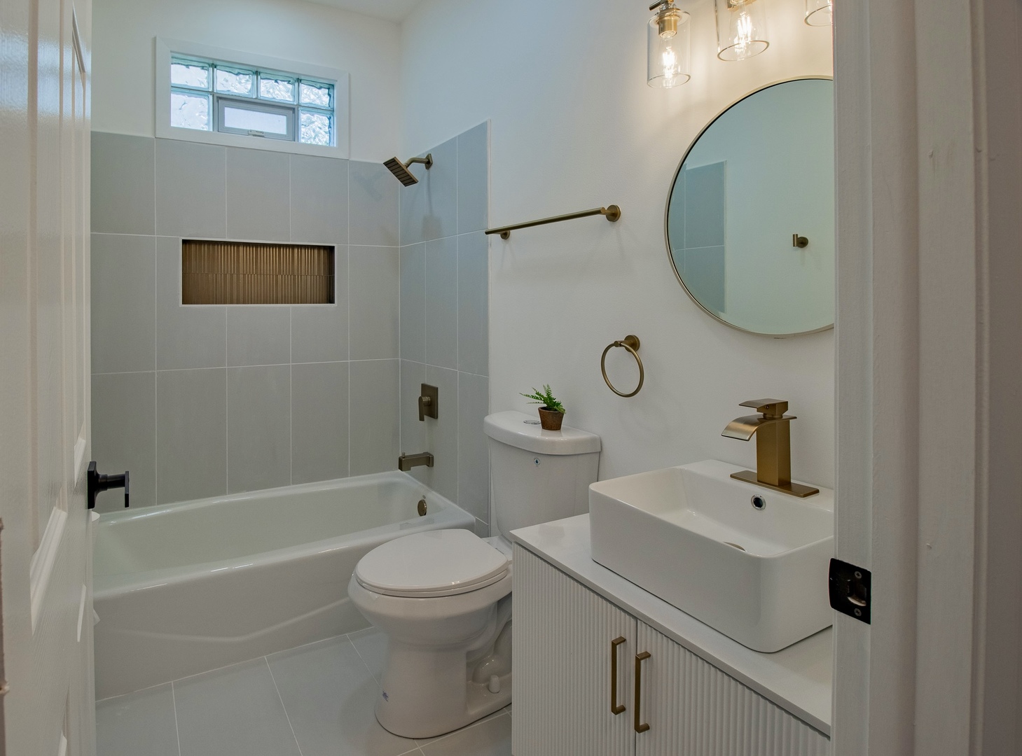 33485 North Mill Road Grayslake, IL 60030 - Photo 10 of 28 a bathroom with a sink a toilet and shower