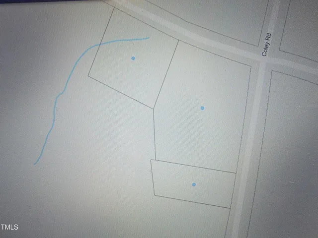 a backyard of a house with trees