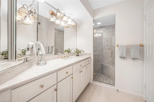 a view of a house with backyard and a deck