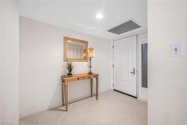 a view of kitchen and cabinets