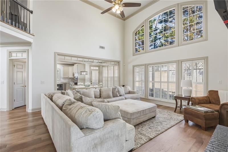 4862 Manatee Court Northwest Powder Springs, GA 30127 - Photo 13 of 46 a living room with furniture and a large window